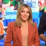 Kit’s houndstooth print blazer on Access Hollywood