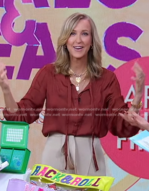 Lara's brown tie neck blouse on Good Morning America