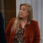 Laura’s floral blouse and red suede blazer on General Hospital