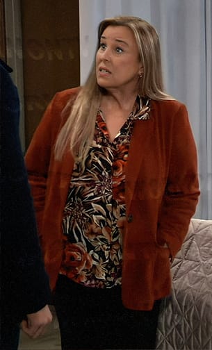 Laura’s floral blouse and red suede blazer on General Hospital