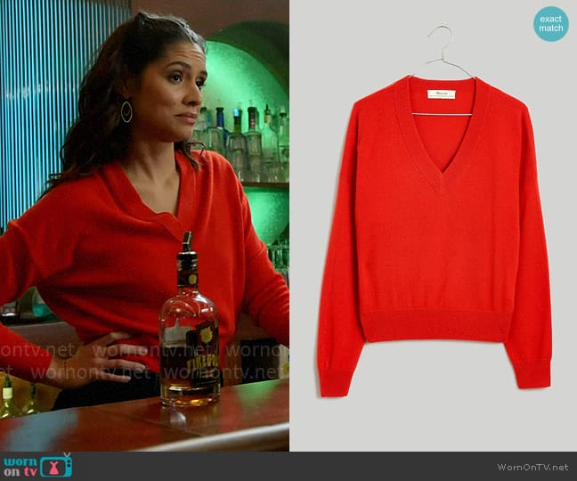 Red v neck hot sale sweater outfit