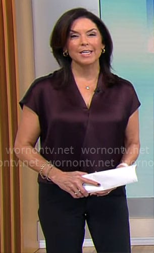 Meg Oliver's dark purple satin top on CBS Mornings