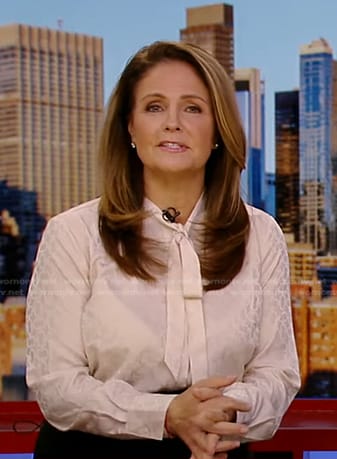 Michelle Charlesworth's ivory tie neck blouse on Good Morning America