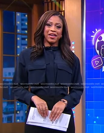 Morgan Norwood's navy patch pocket top on Good Morning America