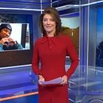 Norah’s red twist neck dress on CBS Evening News