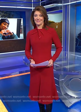 Norah’s red twist neck dress on CBS Evening News