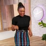 Patina Miller’s black knit top and printed skirt on Sherri