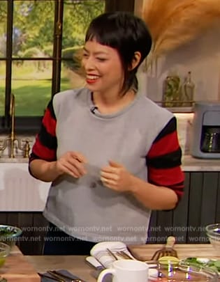 Pilar Valdes's gray hoodie with striped sleeves on The Drew Barrymore Show