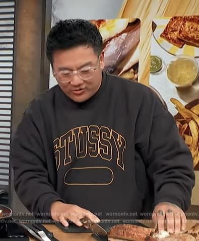 Roy Choi's black stussy sweater on Access Hollywood