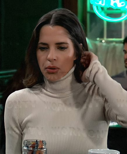 Sam’s off white turtleneck top on General Hospital