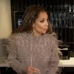 Sunny’s beige feather trim sweater on The View