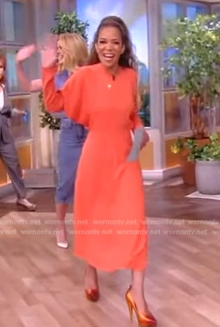 Sunny’s coral long sleeve dress on The View