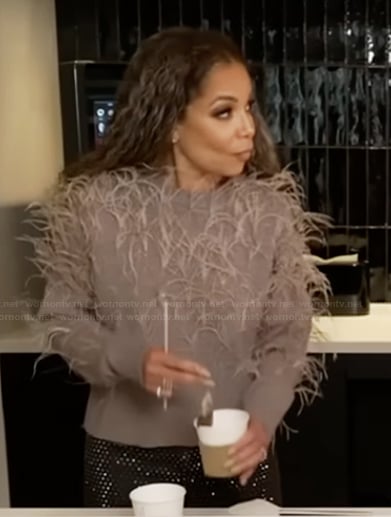 Sunny's beige feather trim sweater on The View