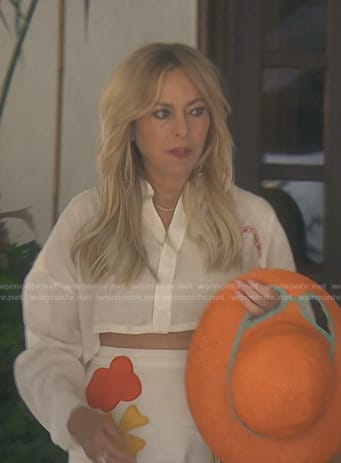 Sutton's white cropped shirt and mini skirt on The Real Housewives of Beverly Hills