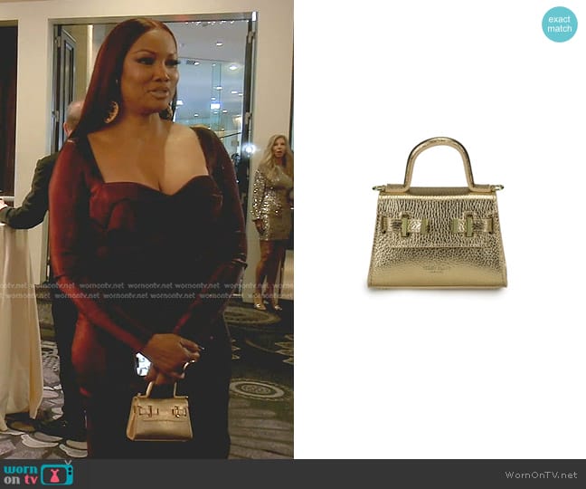 Teddy Blake Ava Gold 6 Bag worn by Garcelle Beauvais on The Real Housewives of Beverly Hills