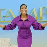 Tamron’s purple gathered midi dress on Tamron Hall Show