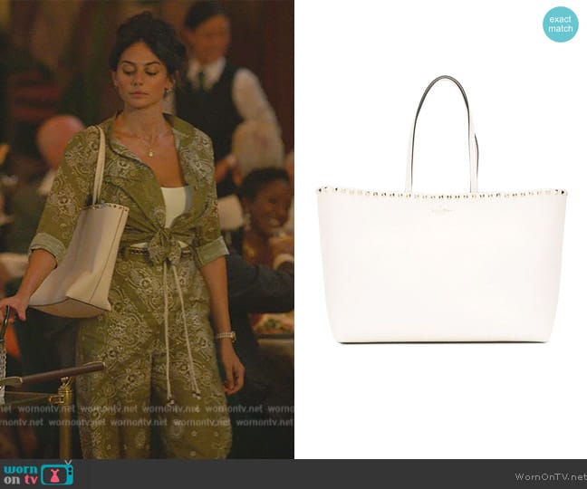 Valentino Garavani Rockstud shopper tote worn by Leila (Pardis Saremi) on Death and Other Details