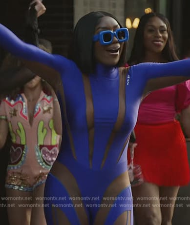 Wendy's blue shadow stripe catsuit and sunglasses on The Real Housewives of Potomac