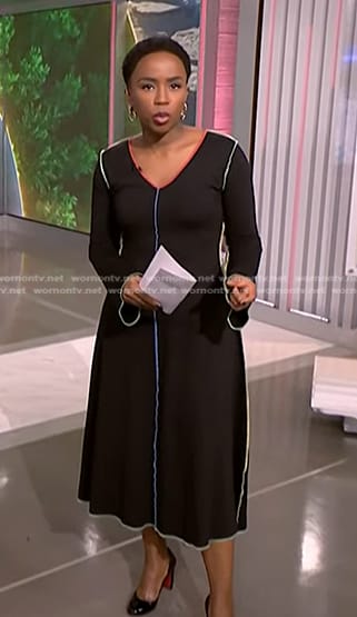 Zinhle’s black dress with multicolor piping on NBC News Daily