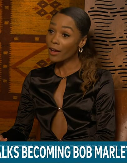 Zuri’s black satin hook and eye button top on Access Hollywood