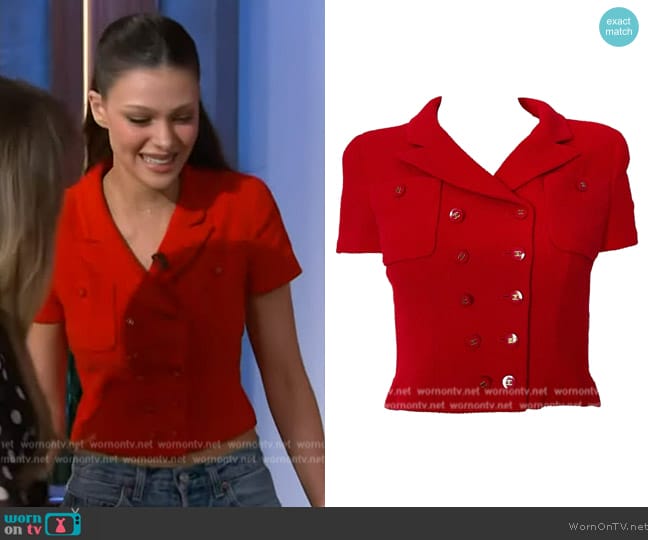 Chanel Red Logo Button Crop Jacket worn by Nicola Peltz on The Kelly Clarkson Show