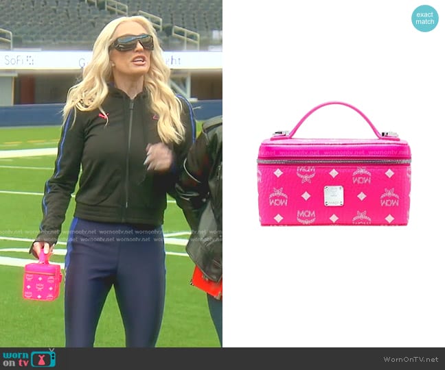 MCM Canvas Rockstar Vanity Case Cox Bag in Neon Pink worn by Erika Jayne on The Real Housewives of Beverly Hills