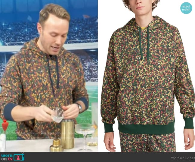 Nike Sportswear Floral Hoodie worn by Paul Zahn on Access Hollywood