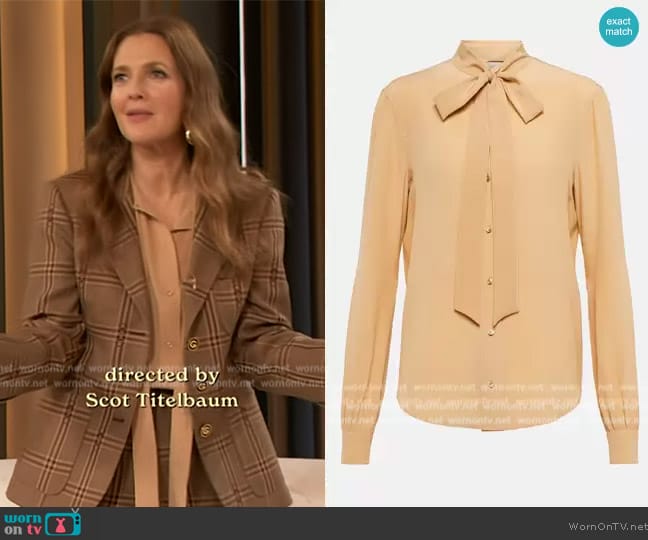 Saint Laurent Tie-neck silk shirt worn by Drew Barrymore on The Drew Barrymore Show