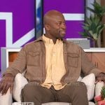 Akbar’s taupe suede jacket on The Talk