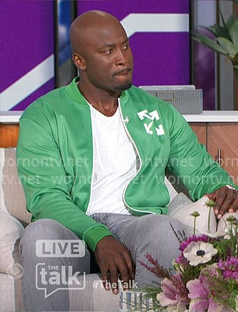 Akbar’s green jacket and sneakers on The Talk