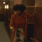 Alexandra’s orange blazer and printed pants on Death and Other Details