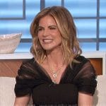 Natalie’s black top with tulle sleeves on The Talk