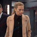 Ava’s black polo dress and camel coat on Days of our Lives