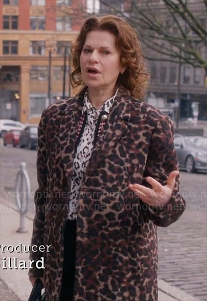 Belinda's white leopard blouse and leopard print coat on So Help Me Todd