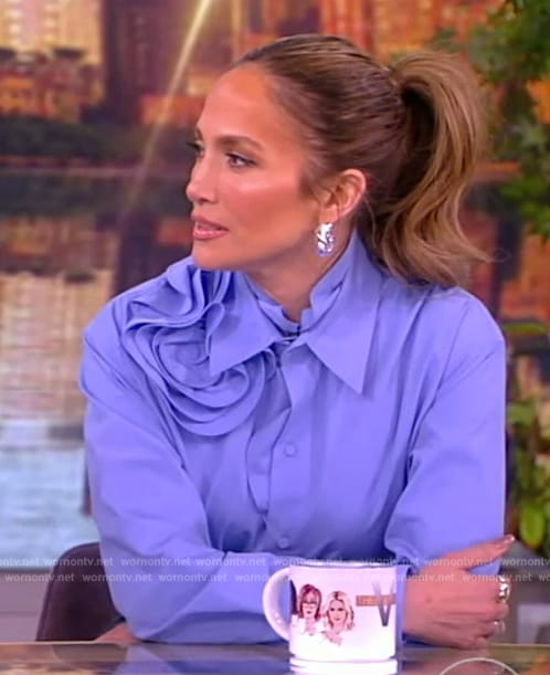 Jennifer Lopez’s blue floral applique blouse on The View