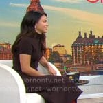 Camila Mendes’ brown turtleneck top and midi skirt with red shoes on CBS Mornings