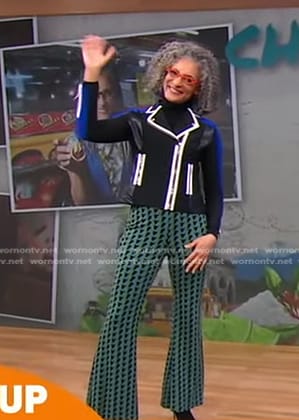 Carla Hall’s black colorblock moto jacket and green geometric pants on Good Morning America