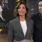 Courtney’s gray embellished cropped blazer by E! News