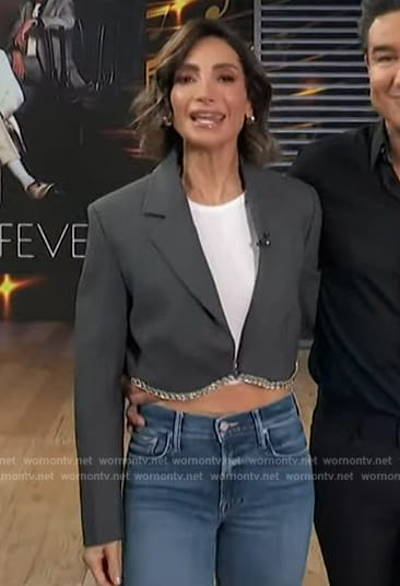 Courtney’s gray embellished cropped blazer by E! News