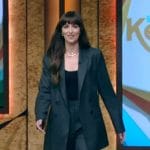 Dakota Johnson’s pinstripe blazer and necklace on Live with Kelly and Mark