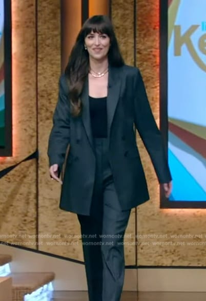 Dakota Johnson's pinstripe blazer and necklace on Live with Kelly and Mark