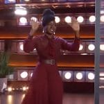 Danai Gurira’s burgundy sheer tie neck dress on The Kelly Clarkson Show