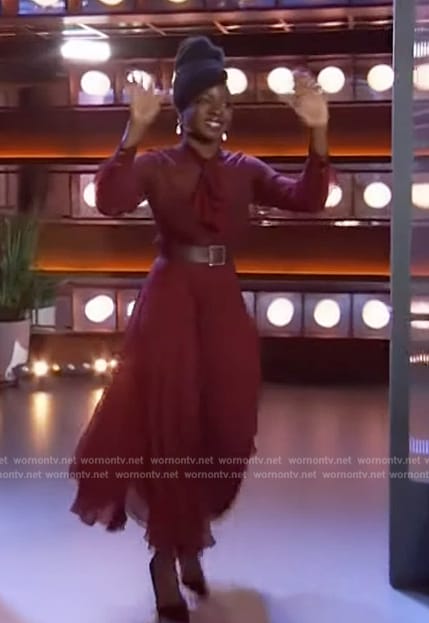 Danai Gurira's burgundy sheer tie neck dress on The Kelly Clarkson Show