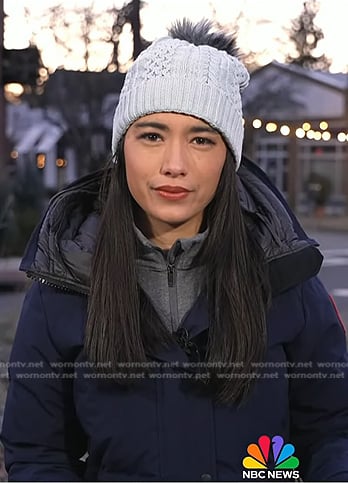 Emilie’s navy down coat and blue pom pom beanie on Today