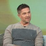 Eric Winter’s colorblock knit sweater on Access Hollywood