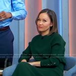 Eva’s green button sleeve sweater and skirt on Good Morning America