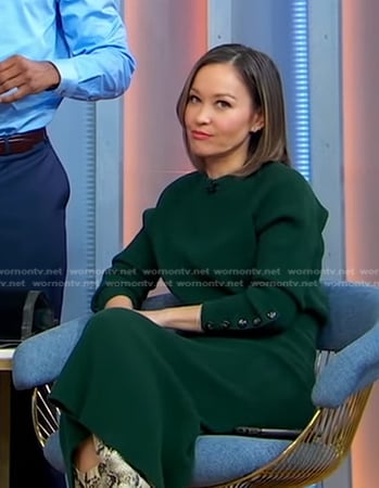 Eva's green button sleeve sweater and skirt on Good Morning America