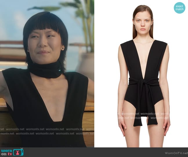 Eleanor’s black tie swimsuit on Death and Other Details