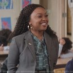 Janine’s gray blazer and check tie neck blouse on Abbott Elementary