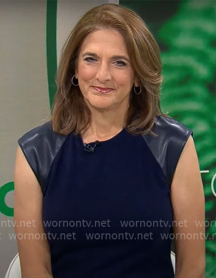 Jill Schlesinger's navy dress with leather shoulders on CBS Mornings